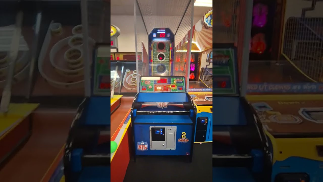 ice NFL 2 Minute Drill football shooter arcade game at Chuck E Cheese (mute)