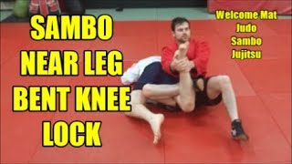 SAMBO NEAR LEG BENT KNEE LOCK