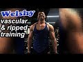 shredded and vascular bodybuilder trainig sholders pre comp