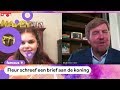 Fleur krijgt felicitaties van de koning
