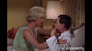 ⁣Doris Day and Rock Hudson in this ICONIC scene from “Send Me No Flowers” (1964)
