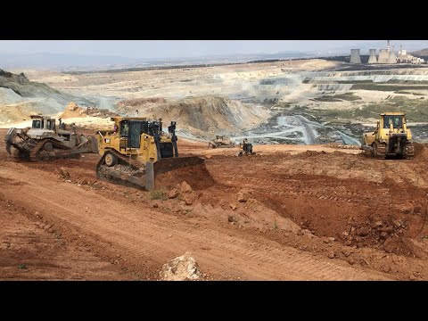 Caterpillar D9T Bulldozer Working With Caterpillar D9R And Komatsu D275AX Bulldozers