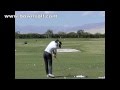 Michelle Wie in slow motion playing a hybrid club