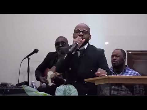 PASTOR TIM ROGERS HONORS THE LATE HUEY WILLIAMS OF THE JACKSON SOUTHERNAIRES AT HIS HOMEGOINGSERVICE