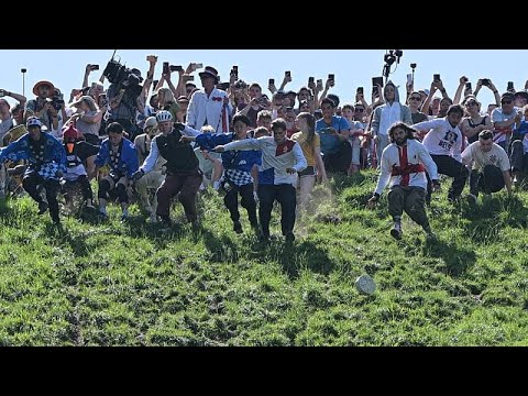 Video Thumbnail: UK: Centuries-old cheese rolling in Brockworth attracts crowds from across Europe