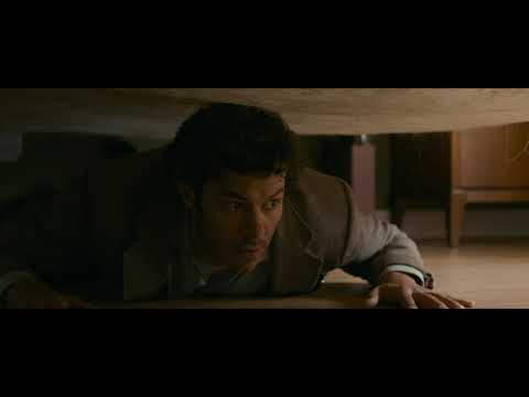 Trailer frame with Abe in a dim office, blinds casting stripes—music leaning noir