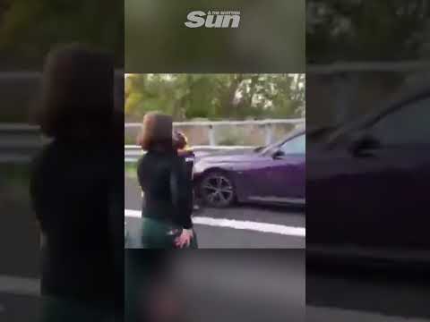 Motorist knocks eco protesters out of the way as he forces car past blockade