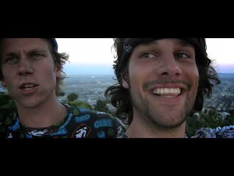 Official trailer thumbnail for Born to Skate showing a skater silhouetted at dusk on an empty road