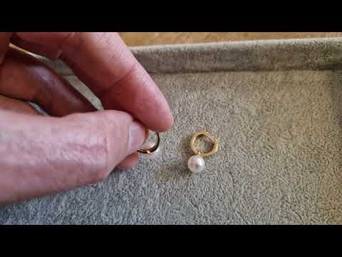 Gouden oorringen met diamant
