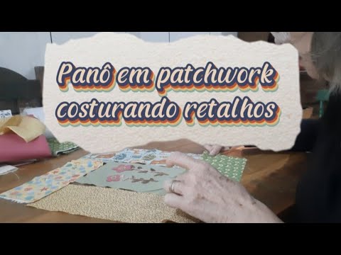 Patchwork wall hanging with appliqué and embroidery.