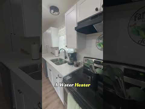 Part of a video titled “Would You Live in a $10,000 Container Home?” - YouTube