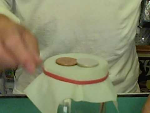 Mike Danata Demonstrates The Coin Through Rubber Sheet Trick