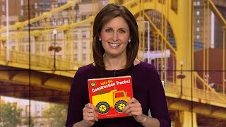 Channel 11 News anchor Katherine Amenta reads the children's book: Let's Go Construction Trucks