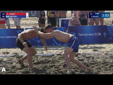 Round 1 Men's BW - 60 kg: H. OZEN (TUR) v. I. MARTIDIS (GRE)