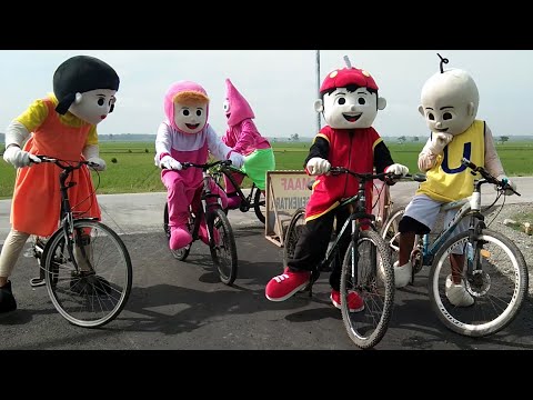 SQUID GAME RIDING BICYCLE | WEARING COSPLAY SQUID, BOBOIBOY, UPIN, PATRICK & MASHA - NGLENYER Video