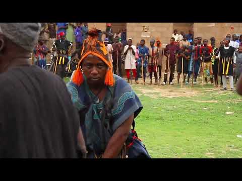 African Magician Eating Razor and Robbing Knife on his Body