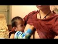 Mom Breast Feeding For Sun