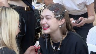 Models, Gigi Hadid and designer Virgil Abloh backstage before the Off White Fashion Show