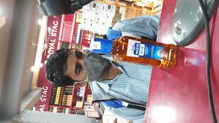 white and blue whisky half bottle painted rate 250 but paid 260