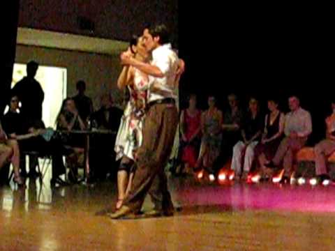  David Alejandro Palo  and  Milena Plebs  are  dancing  to  the  tango  "  El Encopao  "