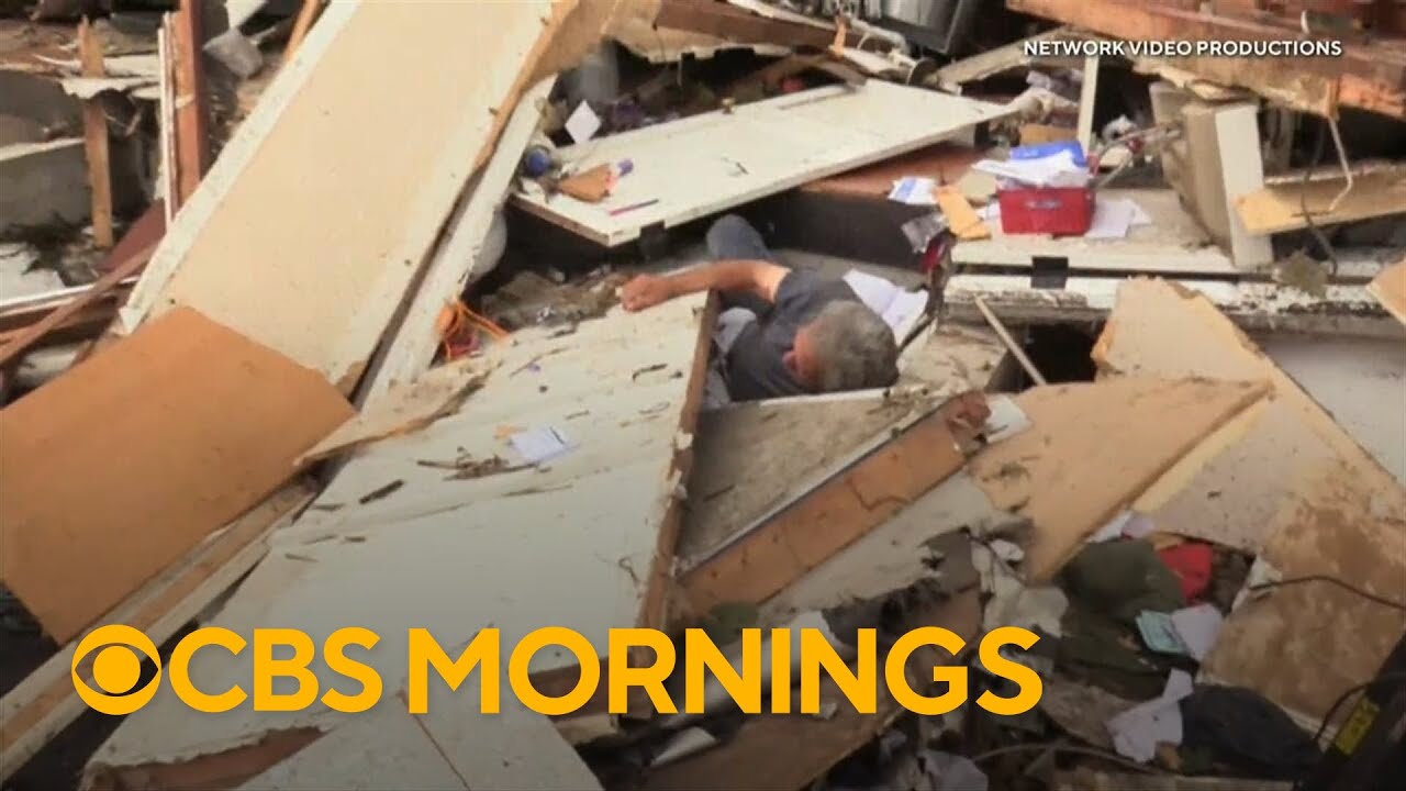 Man trapped under rubble of house after tornado tears through: "I can't get out"