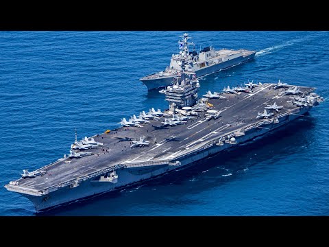B-1B Lancer, A-10, F-16 fighters and a US aircraft carrier in the South China Sea.