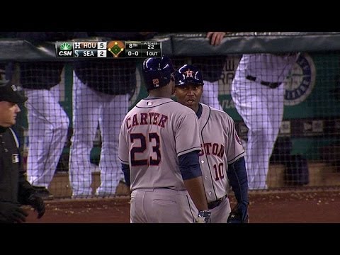Carter lines a bases-loaded single to center