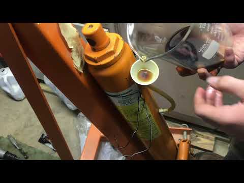 REFILLING  long ram hydraulic bottle jack with fluid (making flexible funnel)