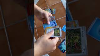 Opening a surging sprarks  Pokemon booster pack
