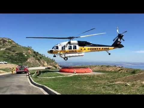 Firefighting Helicopters fight the Malibu Fires