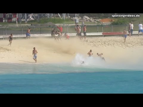 Danger! MD-82 Jet Blast at Maho Beach - St. Maarten - 2014-01-13