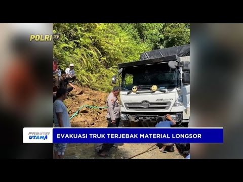 POLRES PASAMAN BARAT EVAKUASI TRUK YANG TERJEBAK LONGSOR