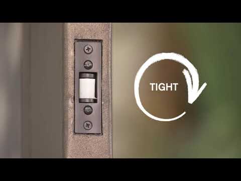 Part of a video titled How to Adjust the Roller Catches on Your Iron Door - YouTube