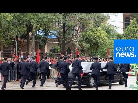 North Korea's Kim Jong-un accompanied by running bodyguards on his way to Hanoi