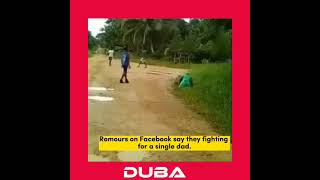 TWO  GIRLS FIGHTING ON THE SIDE OF THE ROAD