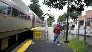 MBTA Commuter Rail to Needham Heights leaving Needham Center.