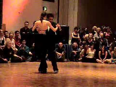  Norberto Esbrez  and  Luiza Paes  are  dancing  to  the  tango  "  Oblivion  "
