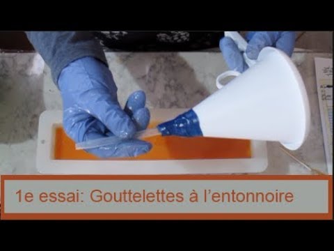 1e essai: gouttelettes avec un entonnoire