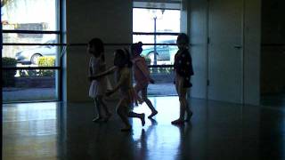 Very young ladies (only 3 - 4 yrs. old) dancing @ the studio with their teacher