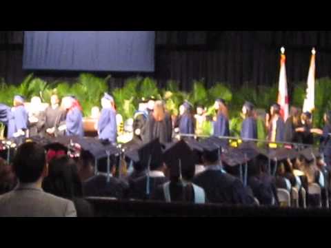 McNamara twins with diplomas