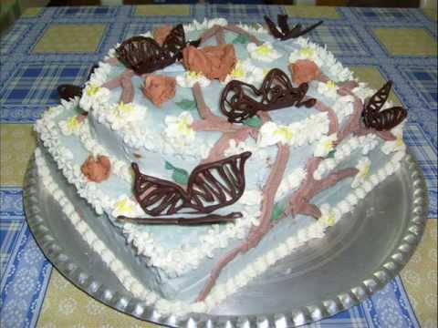 Buttercream tree cake with chocolate butterflies.