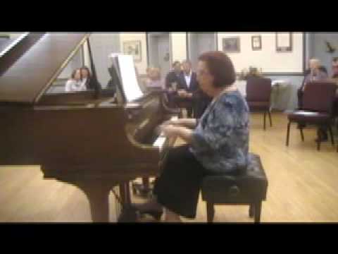 Barbara Carter playing the piano