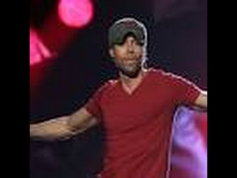 Watch Enrique Iglesias Fall Down Onstage, Recover Like a Champ