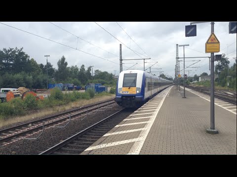 NOB mit ER 20 Dispolok durchfährt Pinneberg in richtung Hamburg Altona