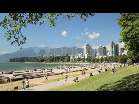 People Enjoying First Beach  Sunset Beach  1. Stock Footage