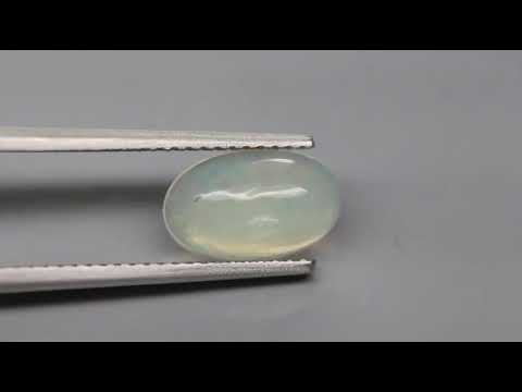 Natuurlijk Opaal Cabochon Kleur Multi Color, oranje groen geel violet blauw knipperend 1,07 ct.
