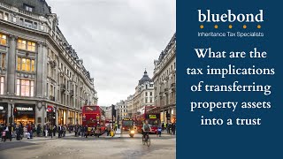 What are the tax implications of transferring property assets into a trust