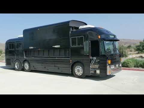 Bus Conversion-Red Bull Stage Bus-Tour Bus-For More Information call (951) 571-8038