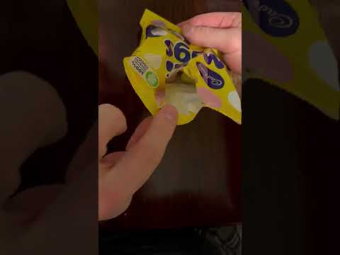 Opening a pack of Cadbury Mini Eggs.