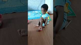 BRAZIL: Independently Putting On her Shoes At Age 1